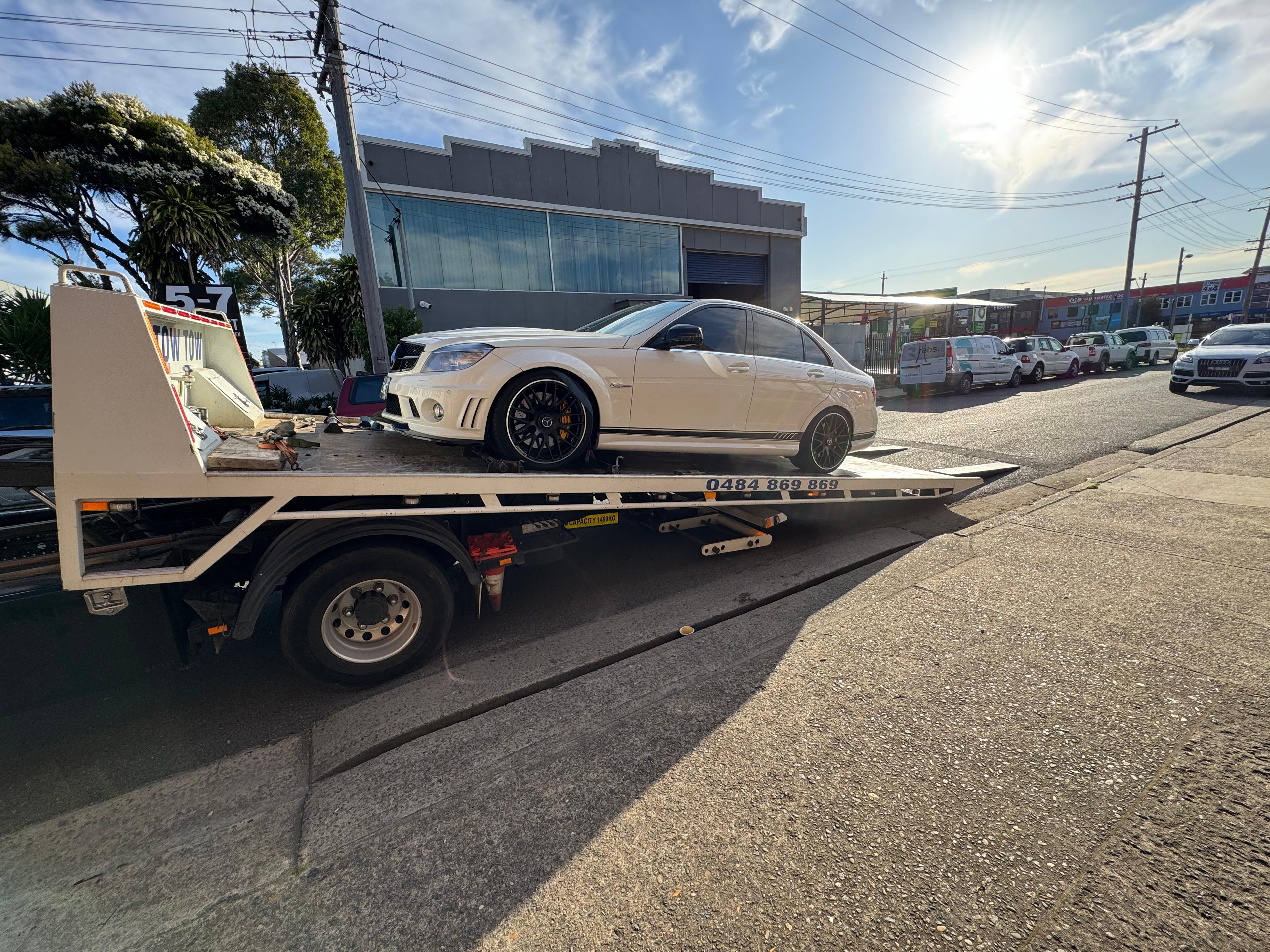 Modern flatbed tow truck - Sydney Platinum Towing